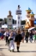 MUNICH, GERMANY - SEPTEMBER 23, 2014: The Oktoberfest in Munich is the biggest beer festival of the world. The visitors are walking at the mainstreet with tents of bavarian breweries.