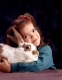 Child with dometicated Rabbit, Kind mit Hauskaninchen